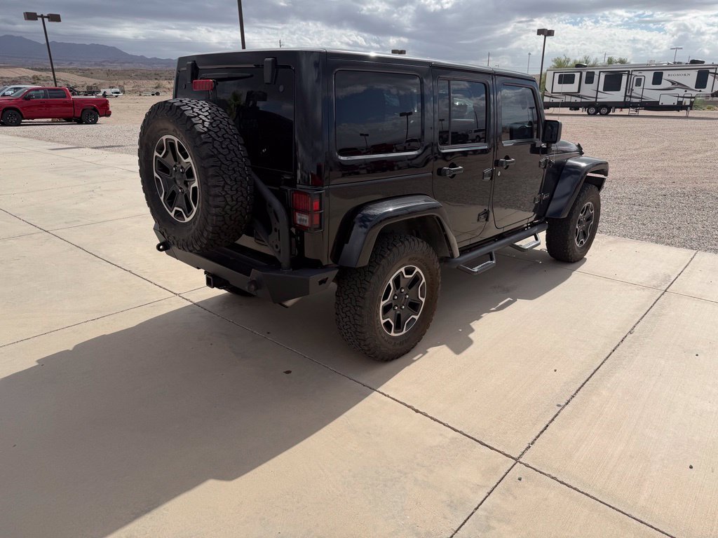 Used 2013 Black Jeep Unlimited Rubicon image 3