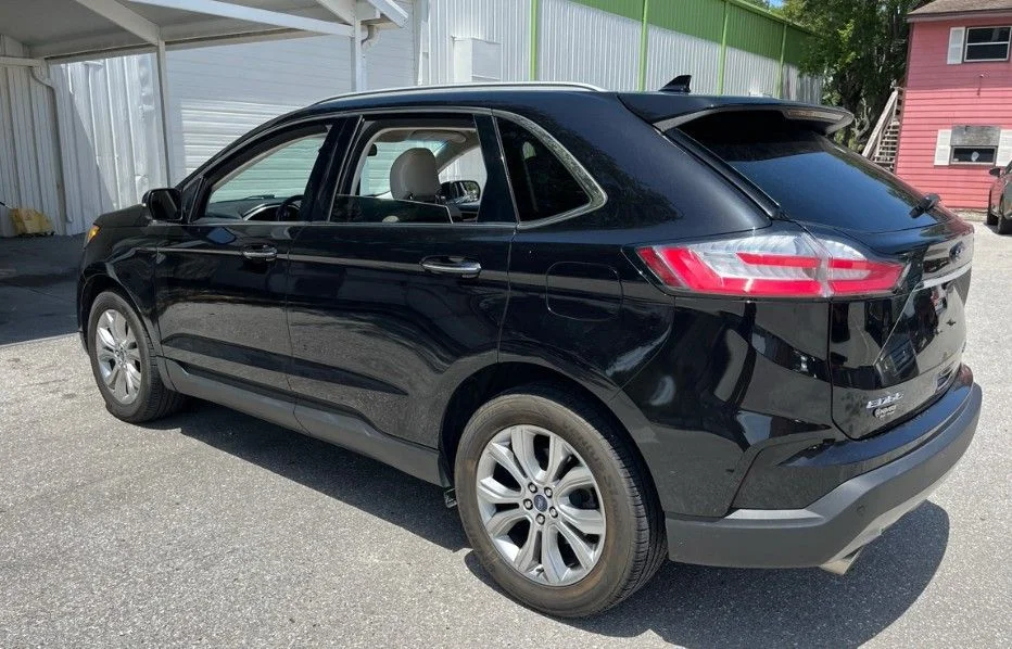 Used 2019 Black Ford Titanium image 4