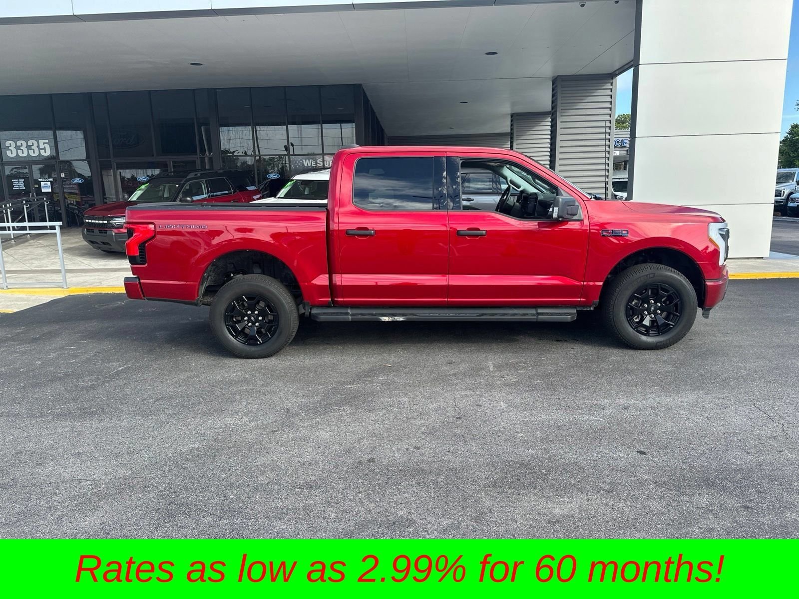 Certified Used 2025 Red Metallic Ford XLT image 3