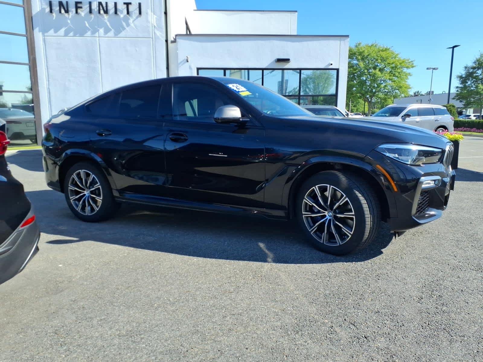 Used 2021 Black Sapphire Metallic BMW M50i image 4