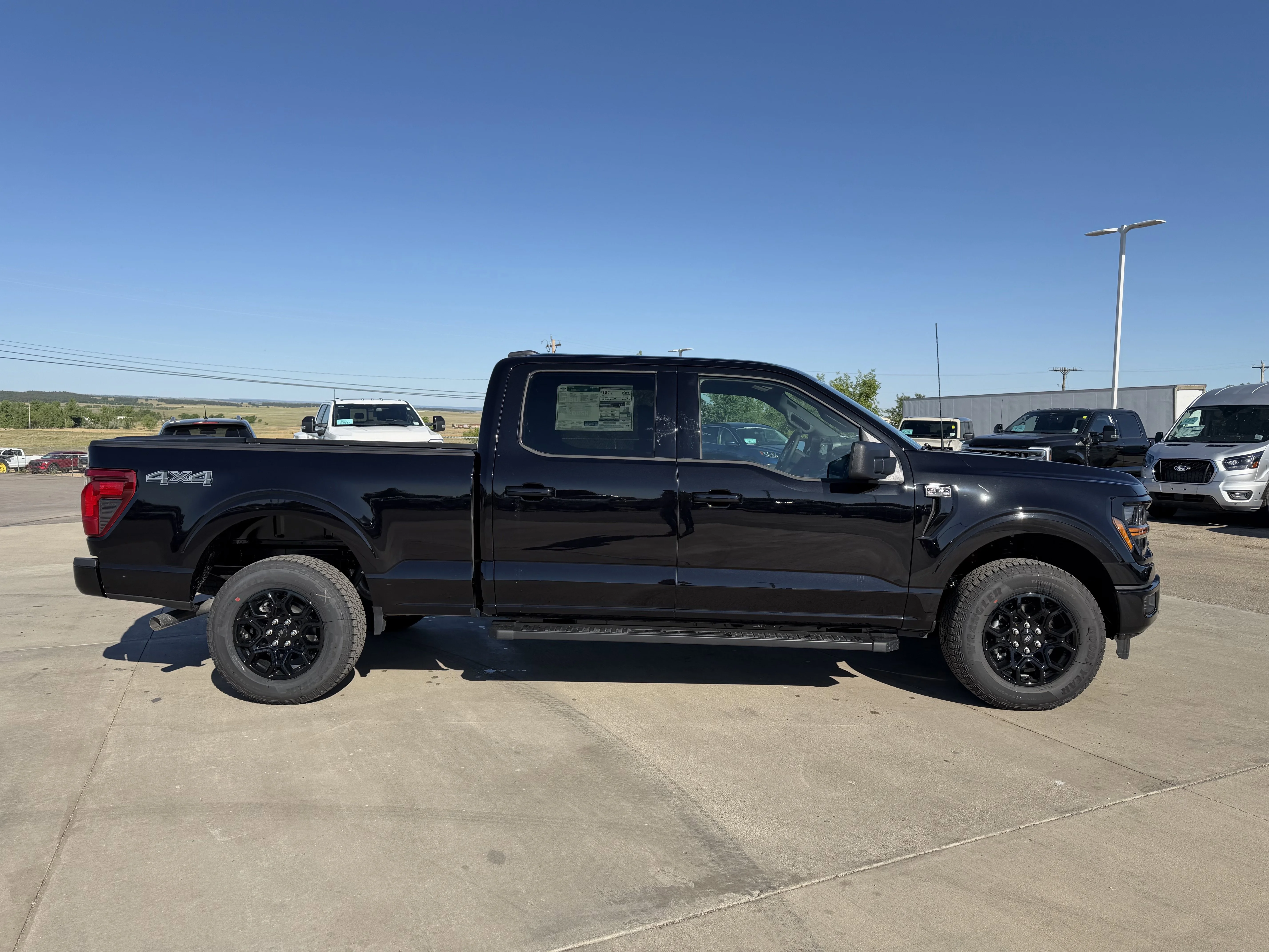 New 2026 Agate Black Metallic Ford XLT image 2