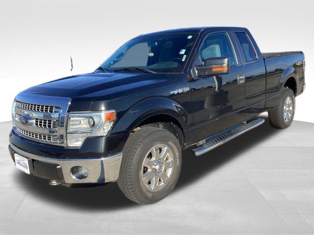 Used 2014 Tuxedo Black Metallic Ford XLT image 1