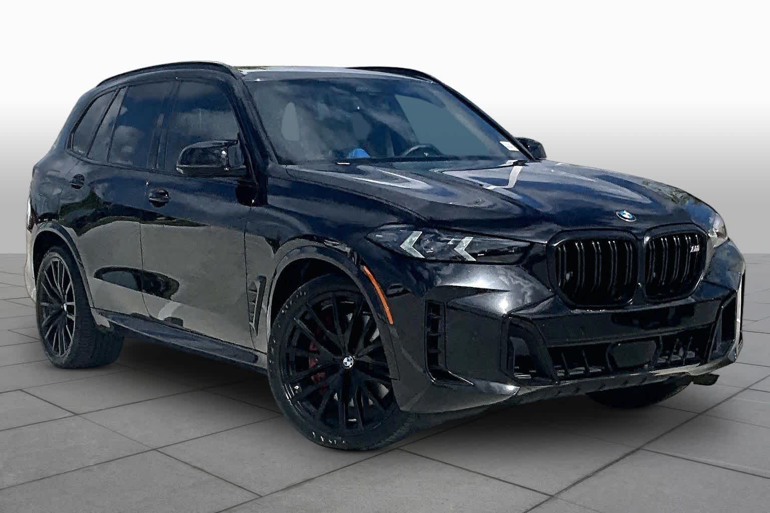 Certified Used 2024 Black Sapphire Metallic BMW M60i image 2