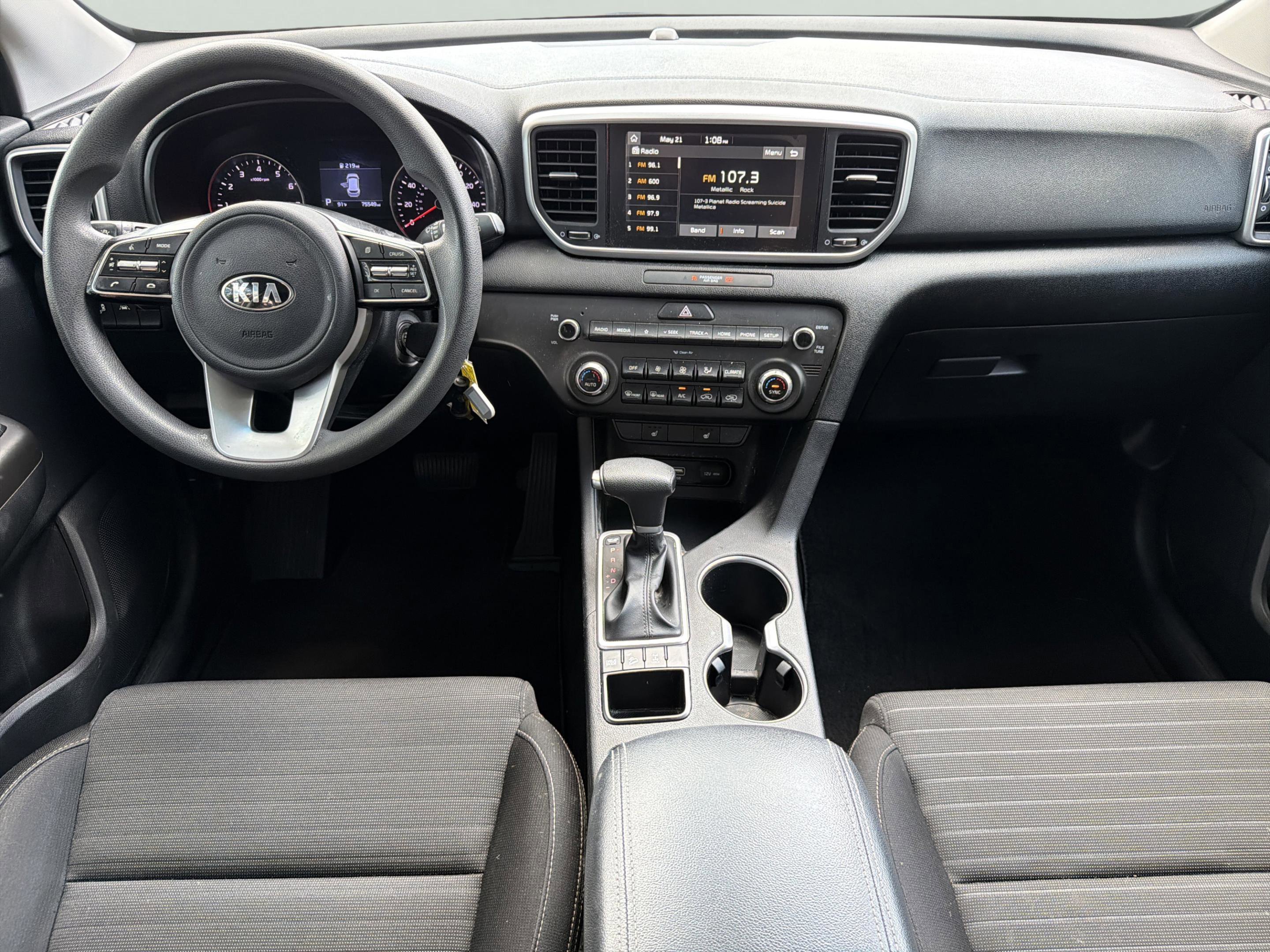 Used 2021 Burnished Copper Kia LX image 9