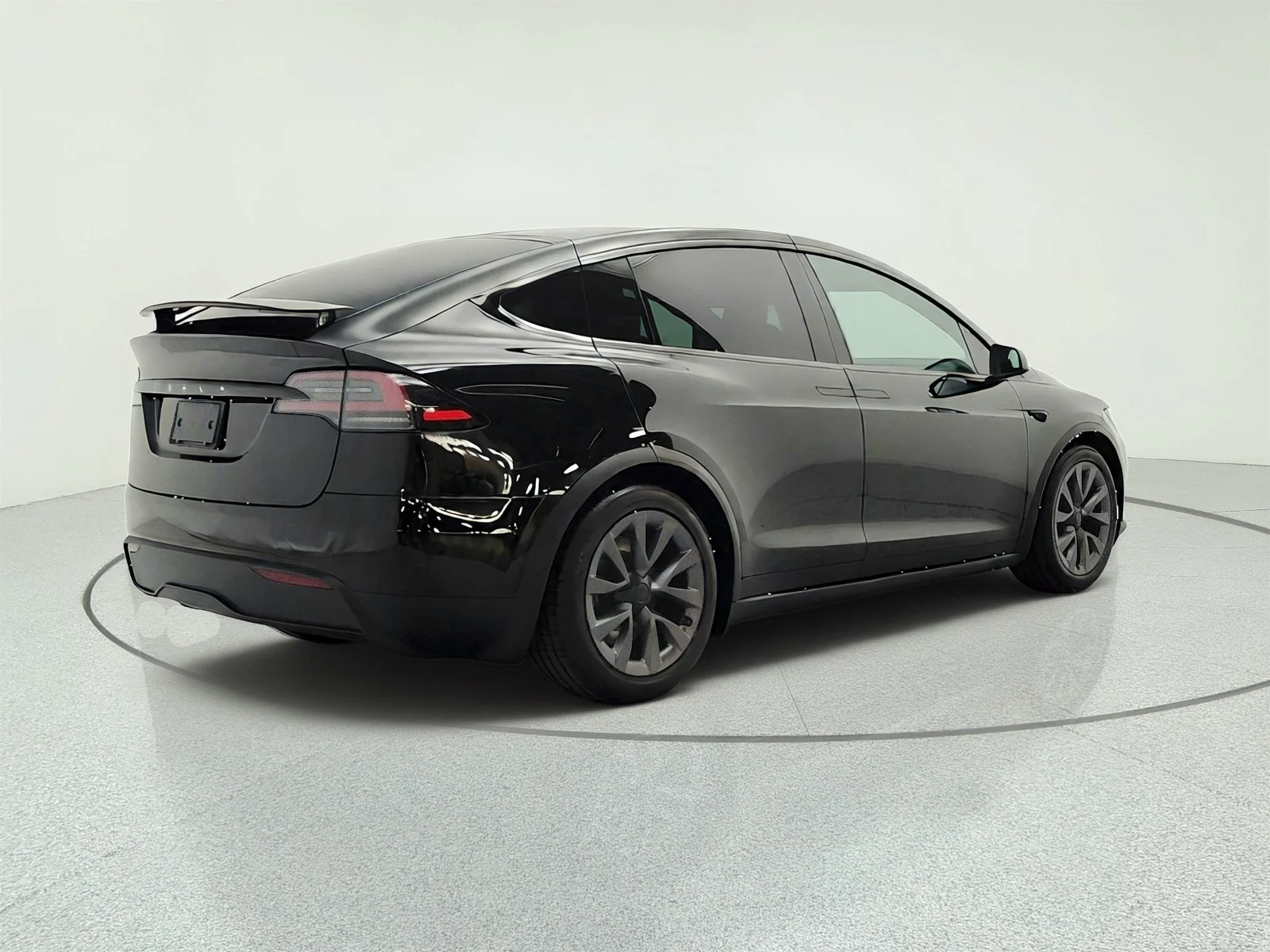 Used 2024 Solid Black Tesla AWD image 5