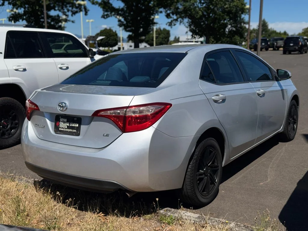 Used 2017 Classic Silver Metallic Toyota LE image 2