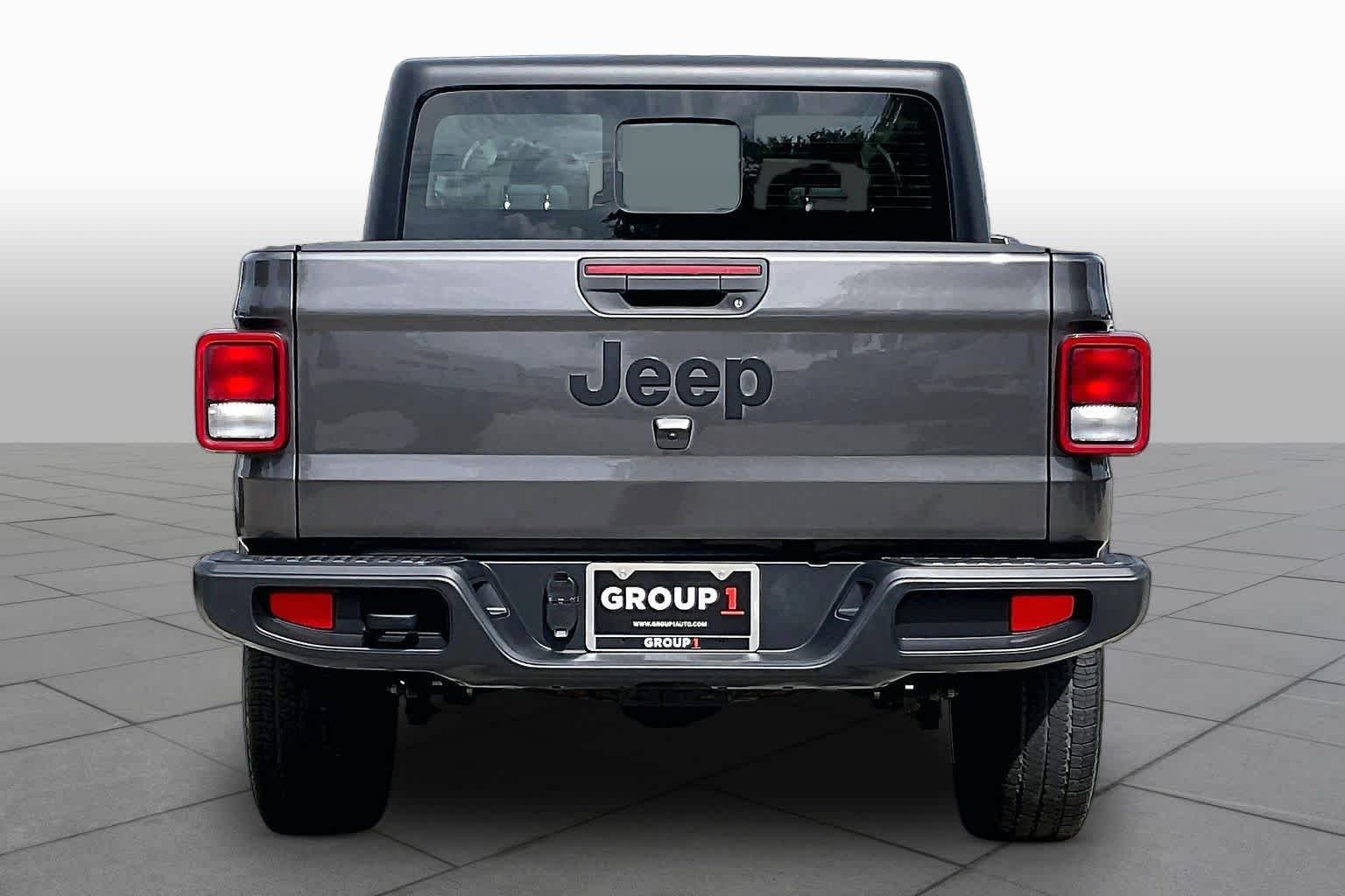 Used 2023 Granite Crystal Metallic Clearcoat Jeep Sport image 5