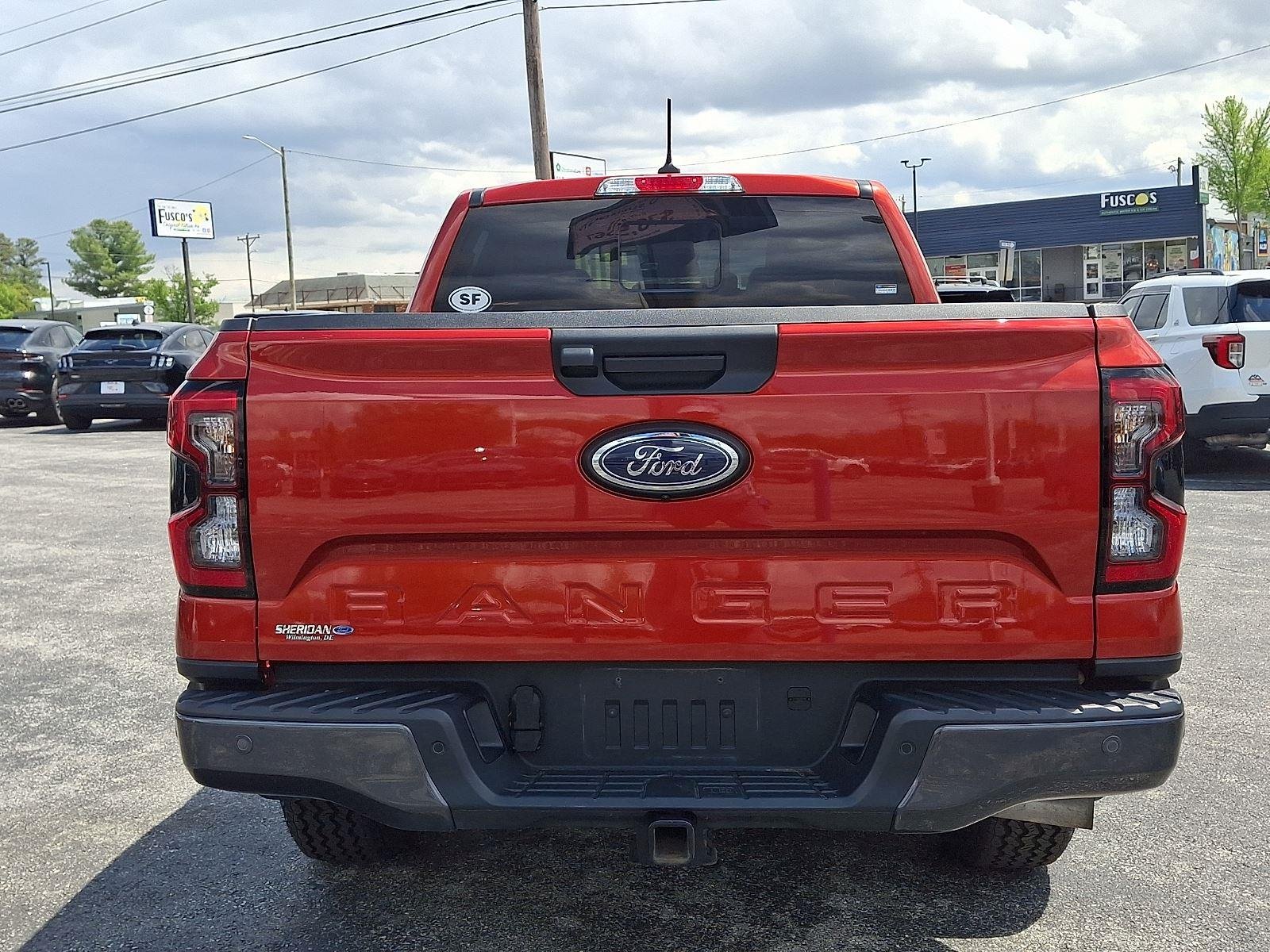 Certified Used 2024 Hot Pepper Red Tinted Clearcoat Ford LARIAT image 5