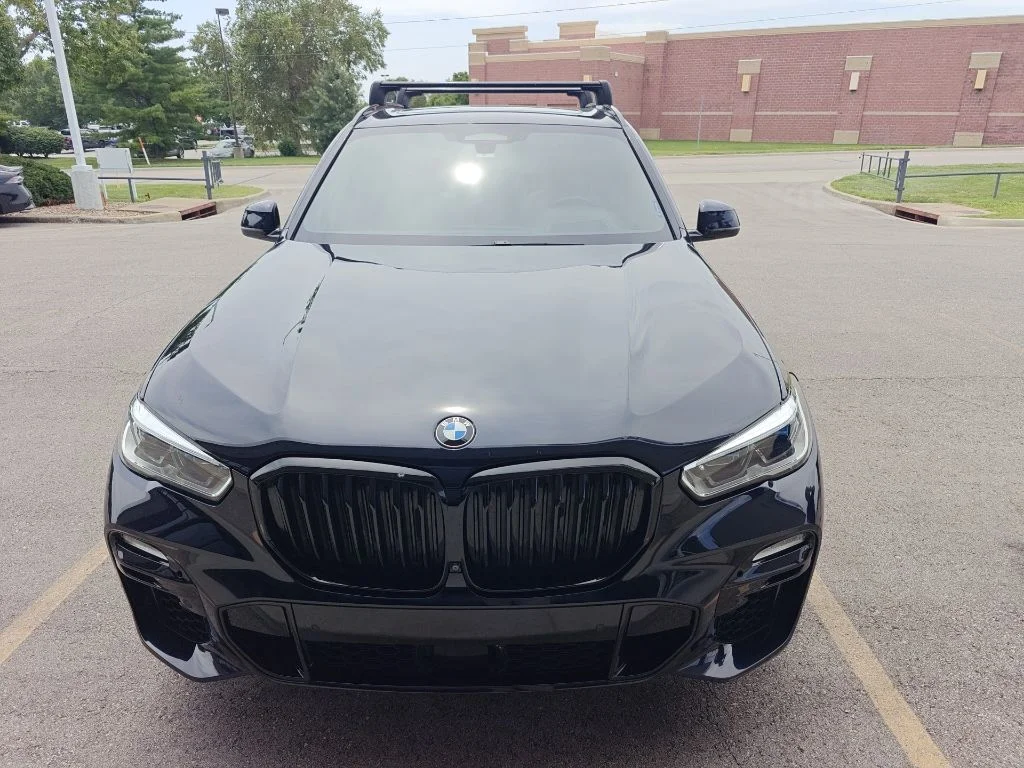 Used 2021 Black BMW xDrive40i image 1