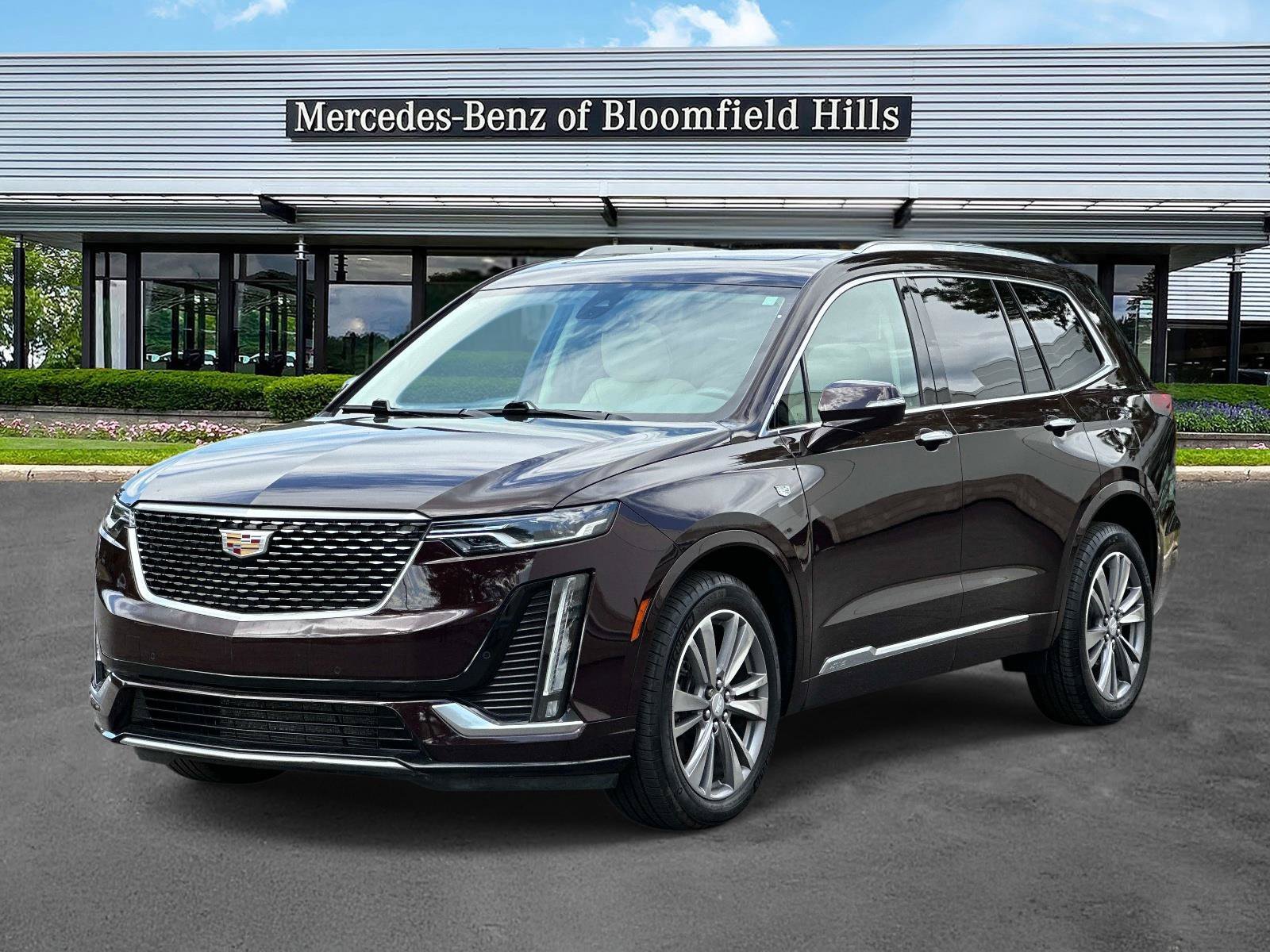 Used 2021 Garnet Metallic Cadillac Premium Luxury image 1