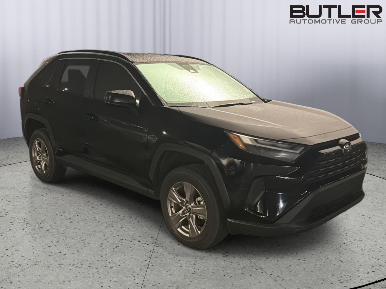 Used 2025 Midnight Black Metallic Toyota Hybrid LE image 6
