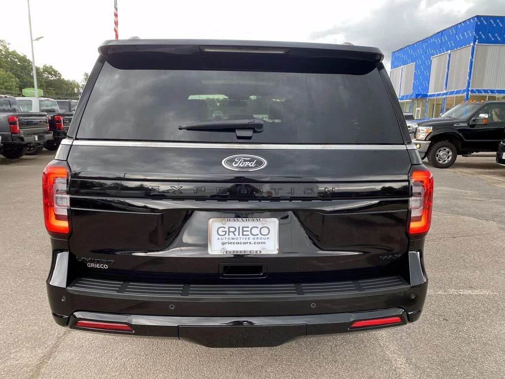 Used 2024 Black Metallic Ford Limited image 4