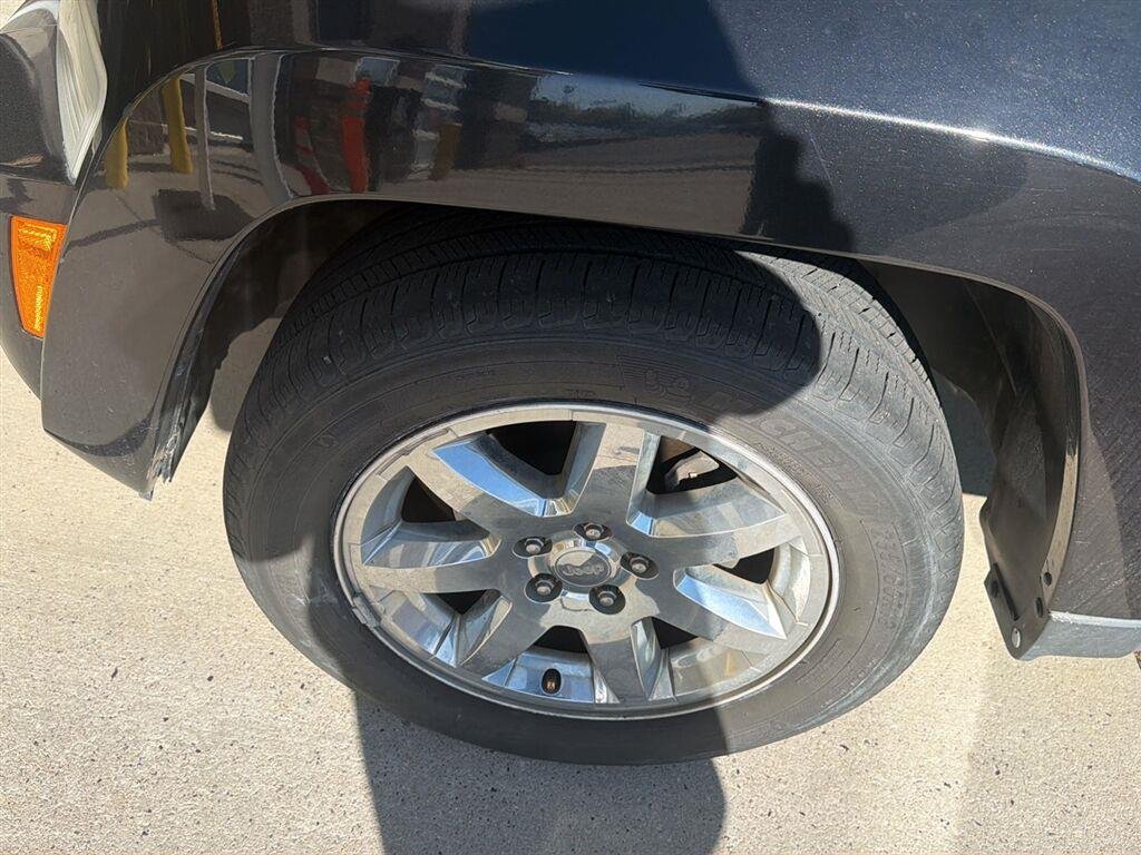 Used 2012 Brilliant Black Crystal Pearl Jeep Sport Latitude image 16