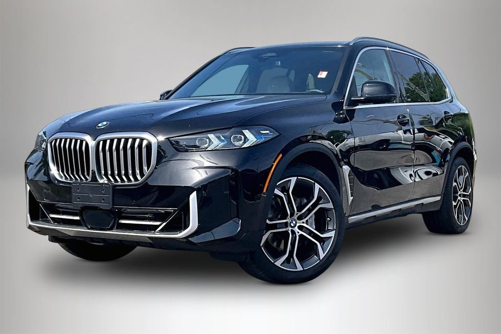 Certified Used 2025 Black BMW xDrive40i image 2