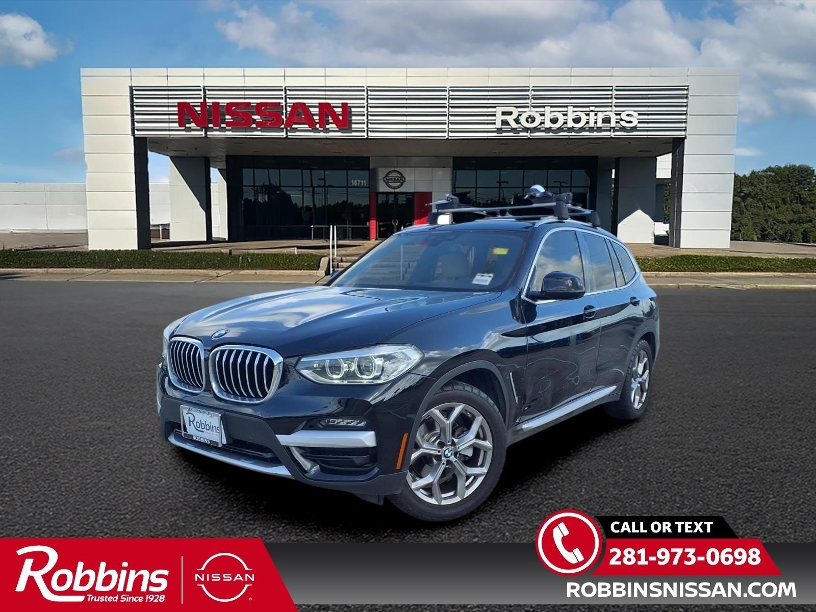 Used 2021 Jet Black BMW sDrive30i image 1