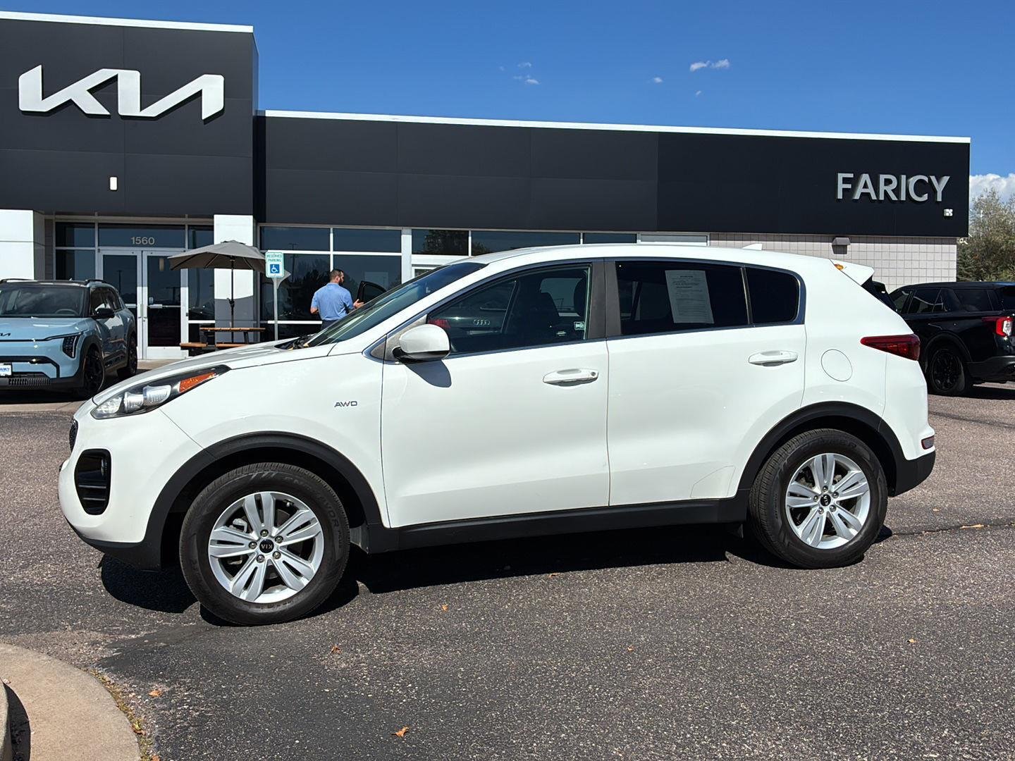 Used 2019 Clear White Kia LX image 1