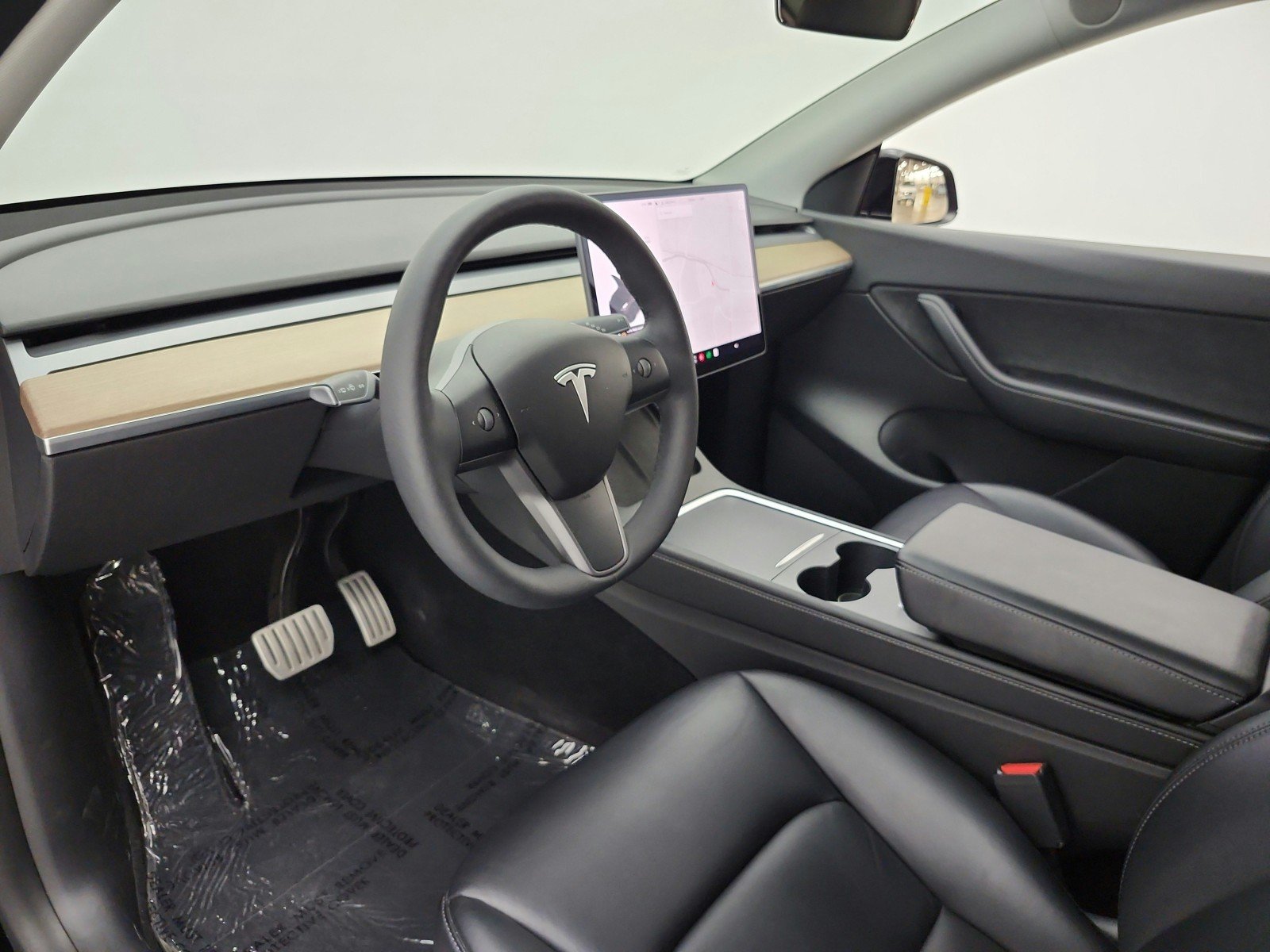Used 2022 Solid Black Tesla Performance AWD image 12