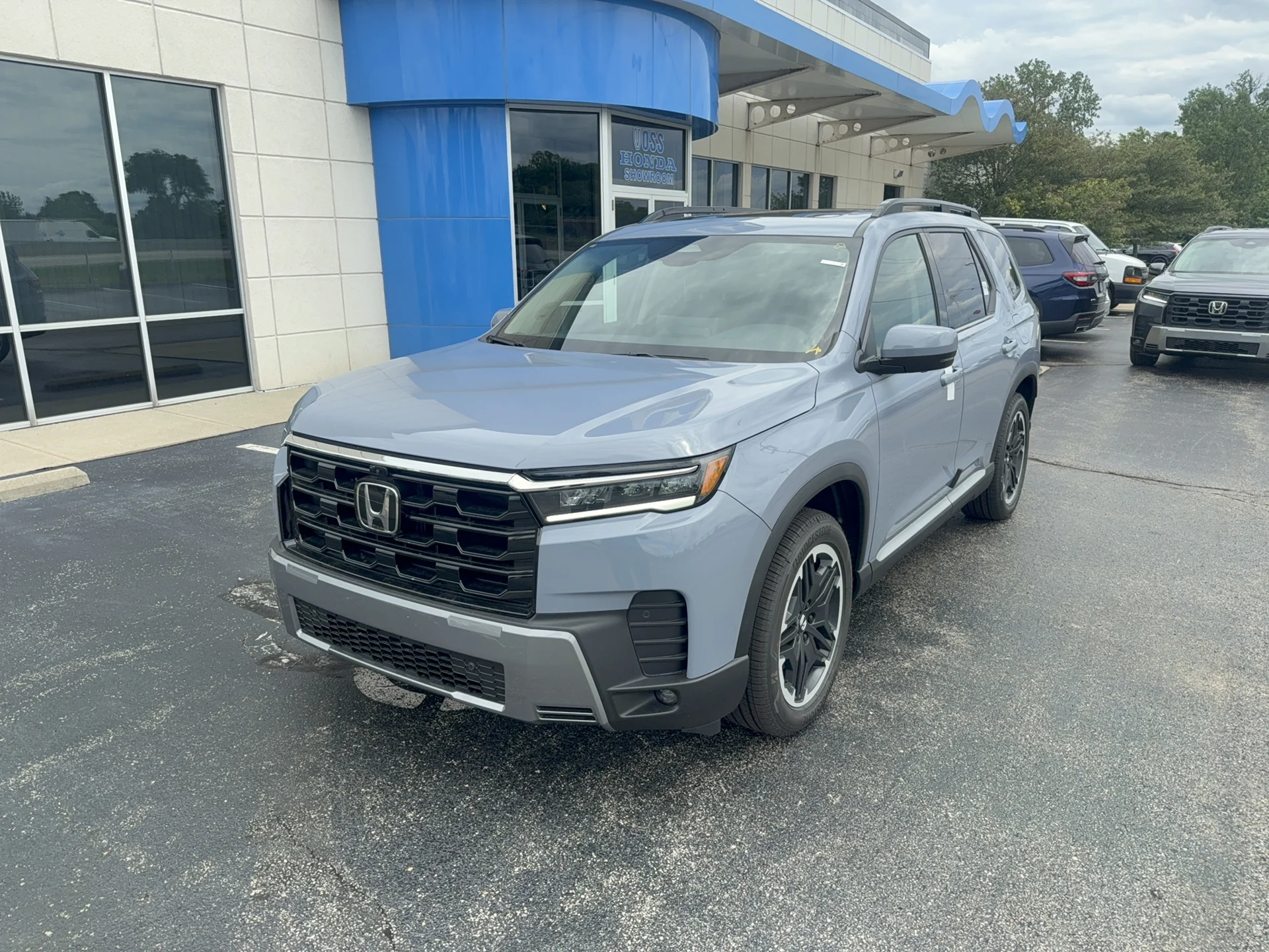 New 2026 Sonic Gray Pearl Honda Touring Blackout image 1