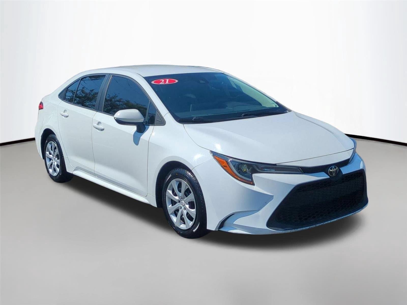 Used 2021 Super White Toyota LE image 7