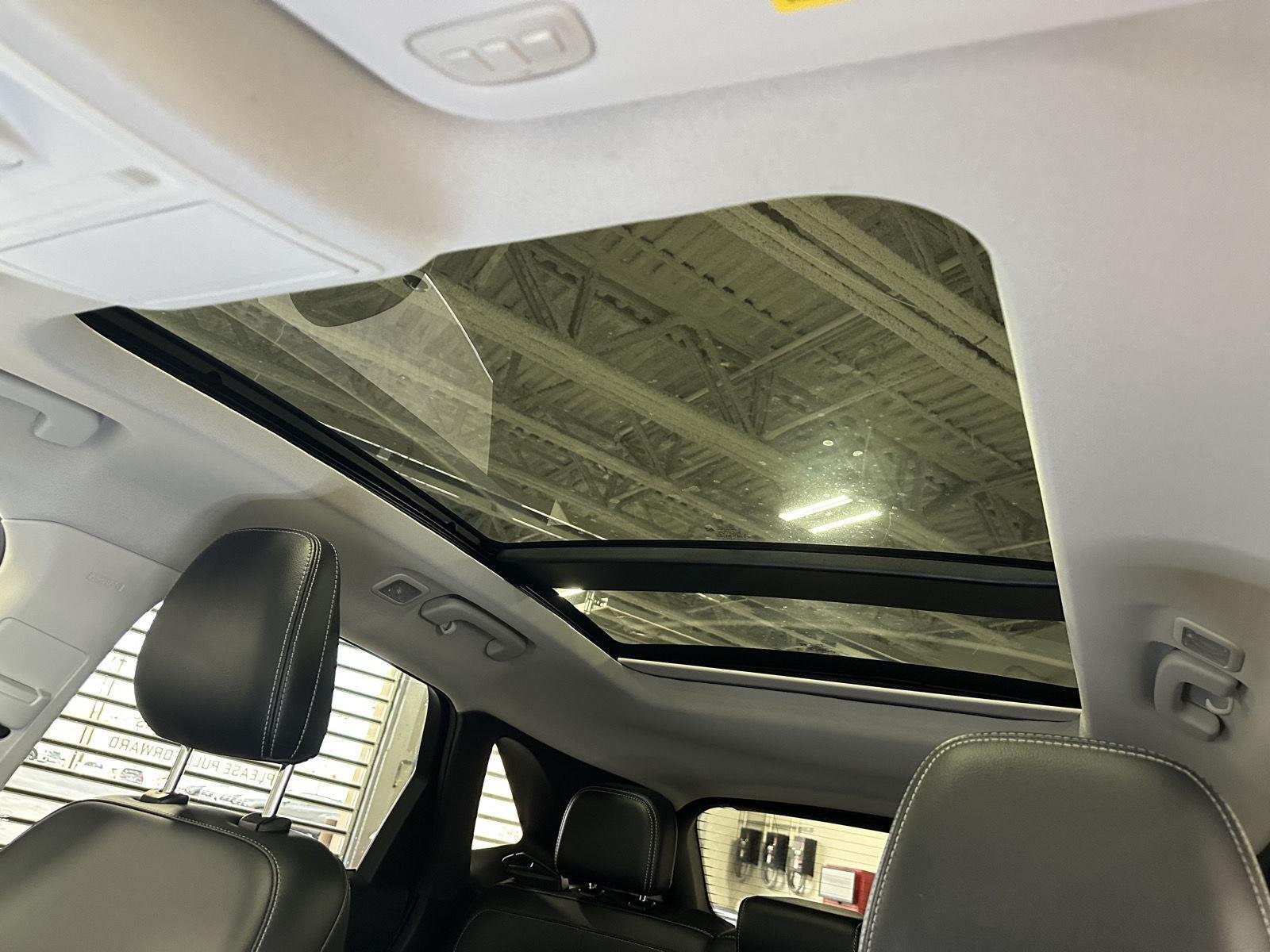 Used 2021 Star White Metallic Tri-Coat Ford Titanium Hybrid image 35