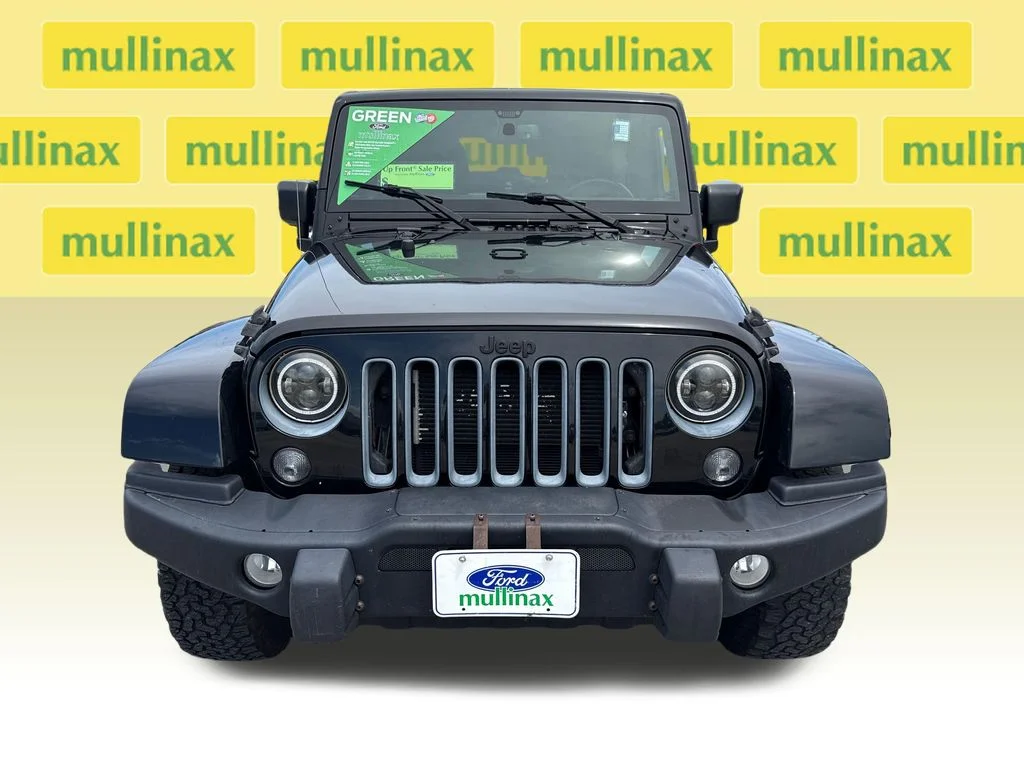 Used 2016 Black Jeep Unlimited Sahara image 9