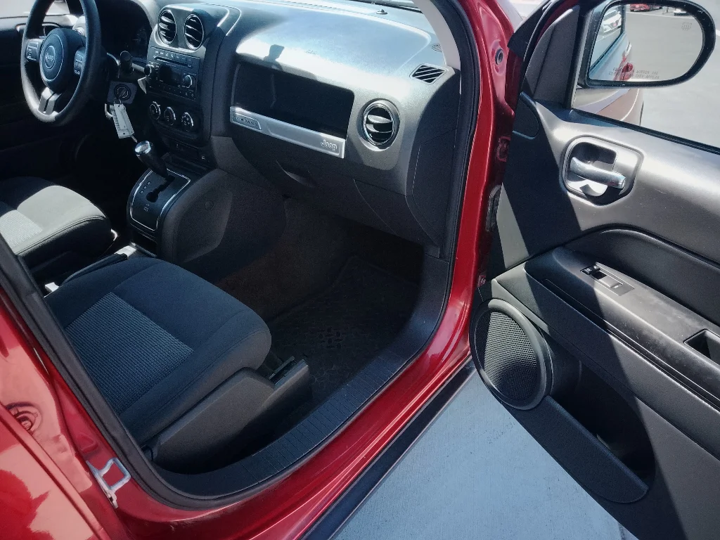 Used 2016 Deep Cherry Red Crystal Pearlcoat Jeep Sport image 13