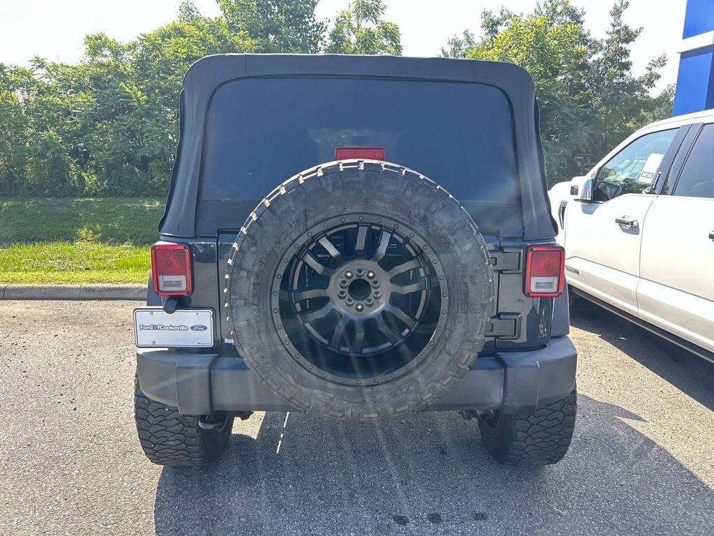 Used 2017 Rhino Clearcoat Jeep Unlimited Sport image 4