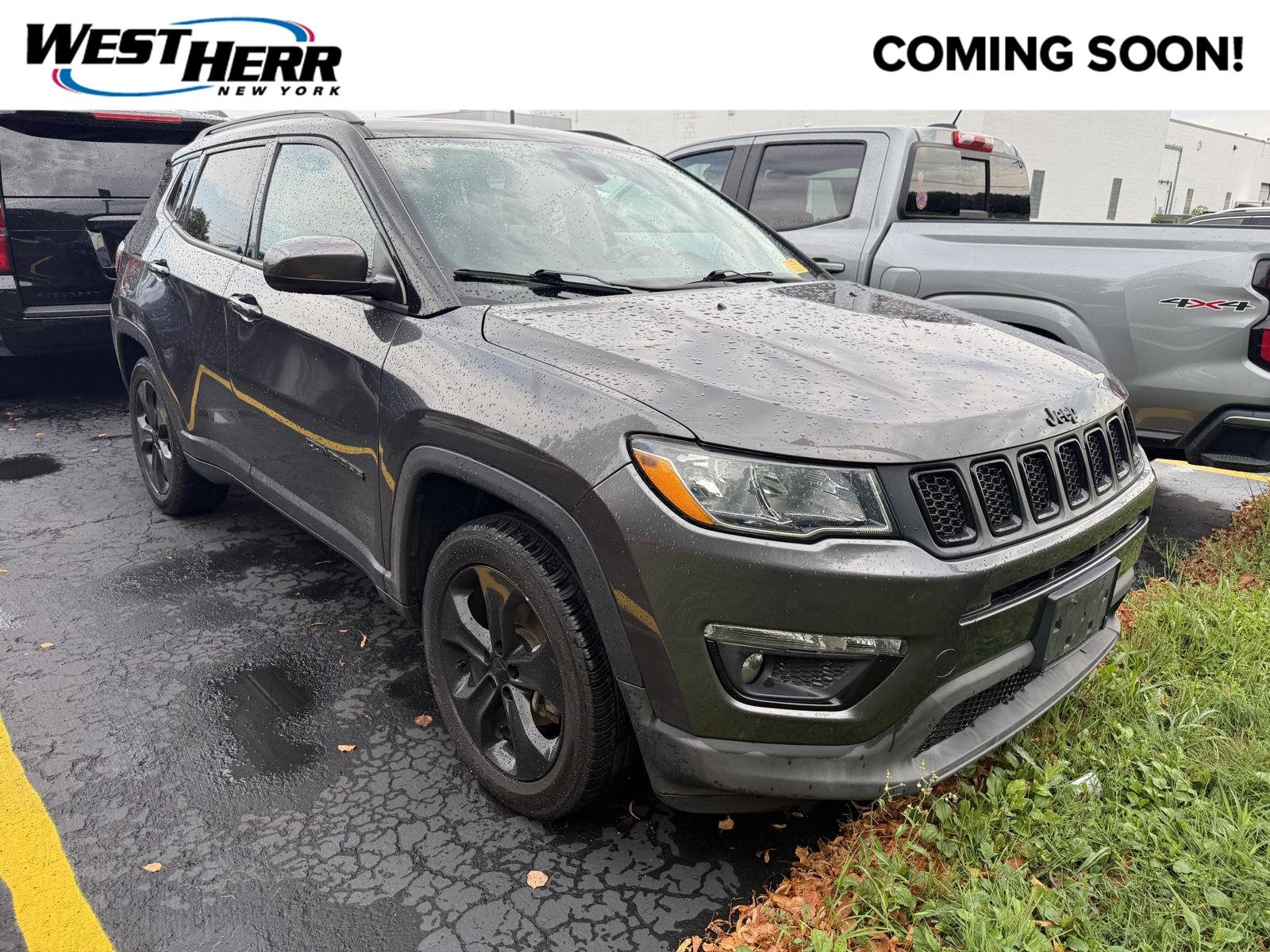 Used 2021 Granite Crystal Metallic Clearcoat Jeep Altitude image 1