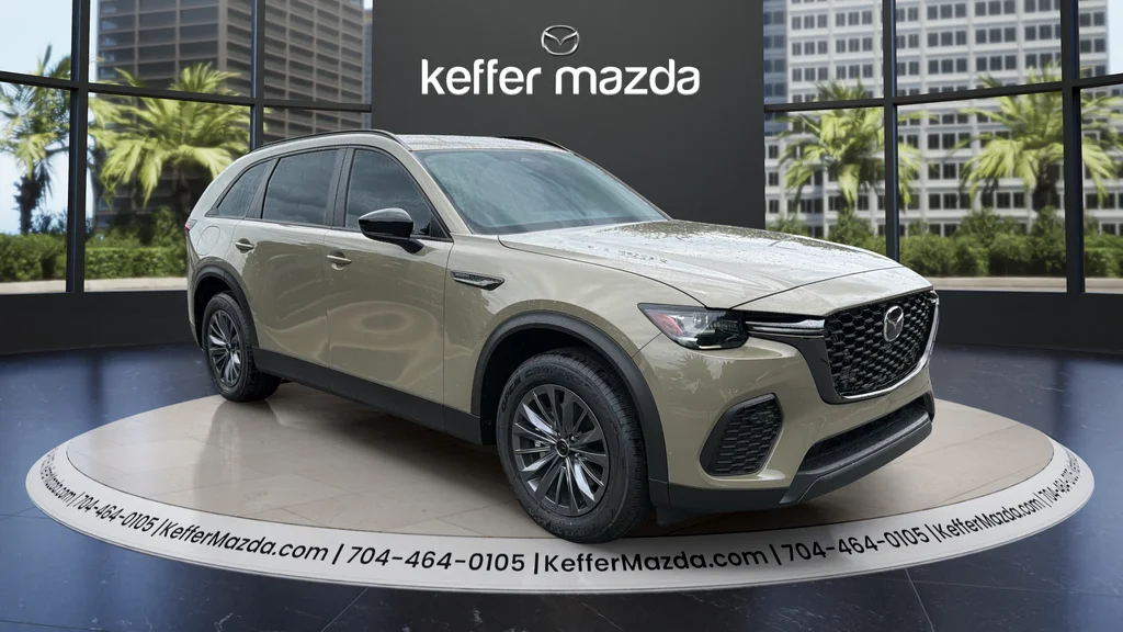 New 2026 Sand Metallic Mazda SC Plus AWD image 1