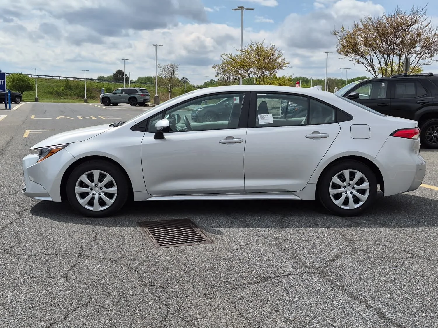 Used 2026 Classic Silver Metallic Toyota LE image 7