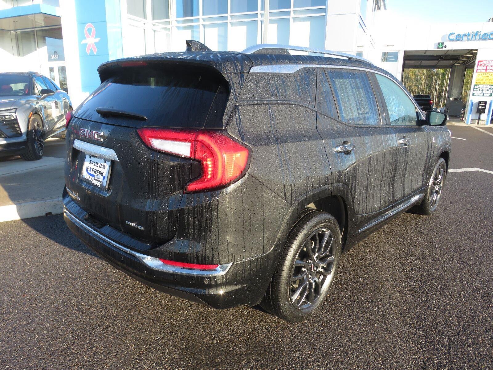 Used 2024 Ebony Twilight Metallic GMC Denali image 5