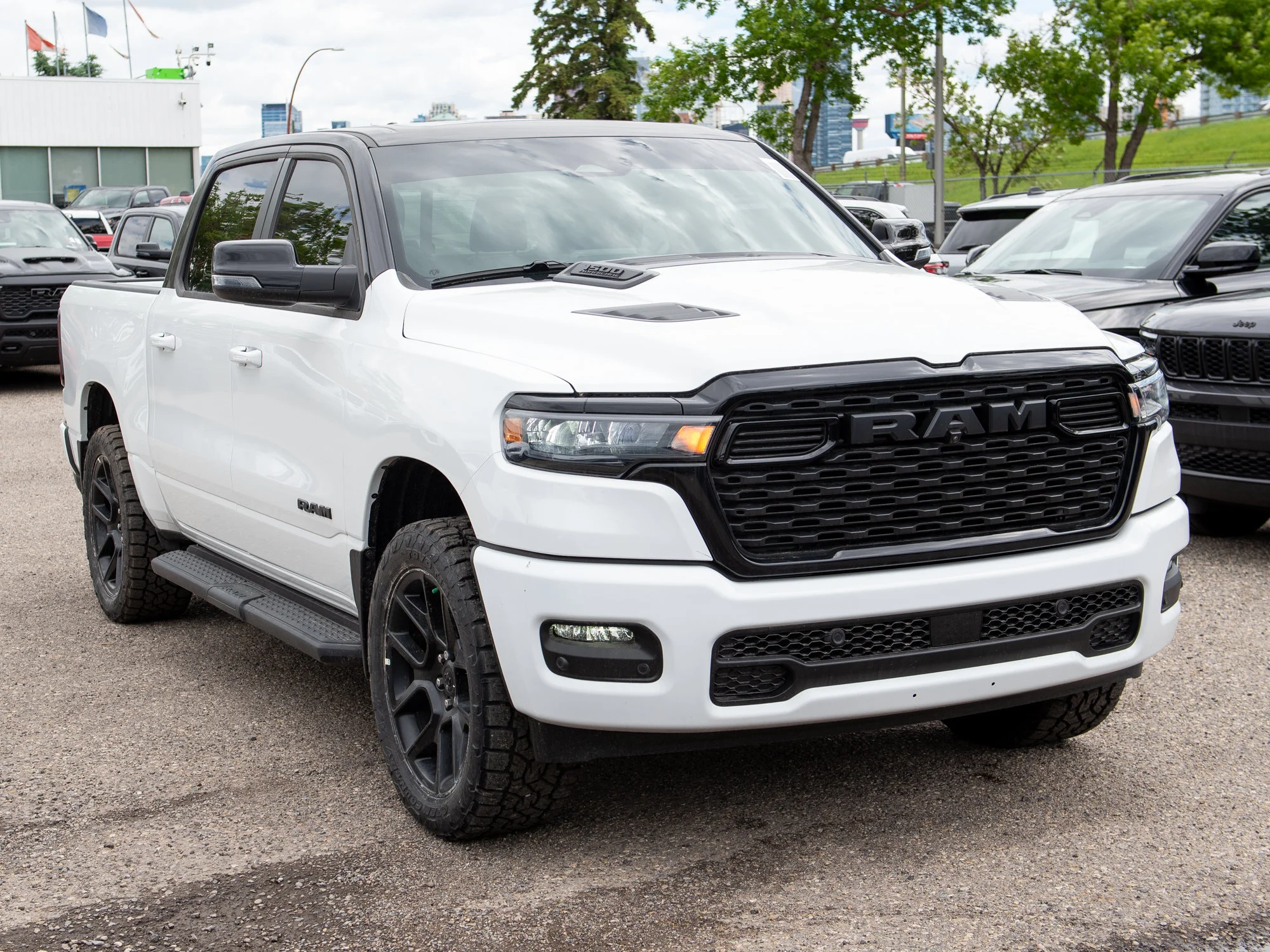 New 2026 White RAM Sport*, 2 Inch Lift, 33 Inch Tires image 8