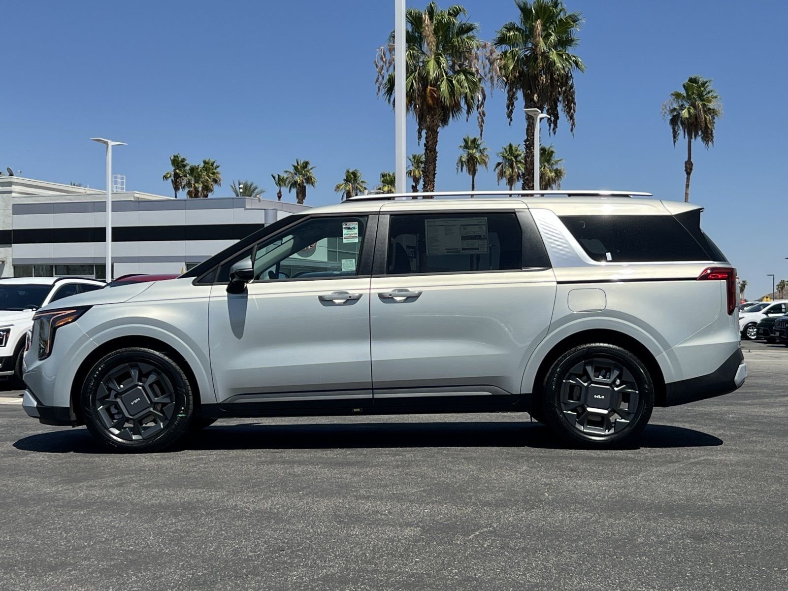 New 2026 Ivory Silver Kia EX image 6