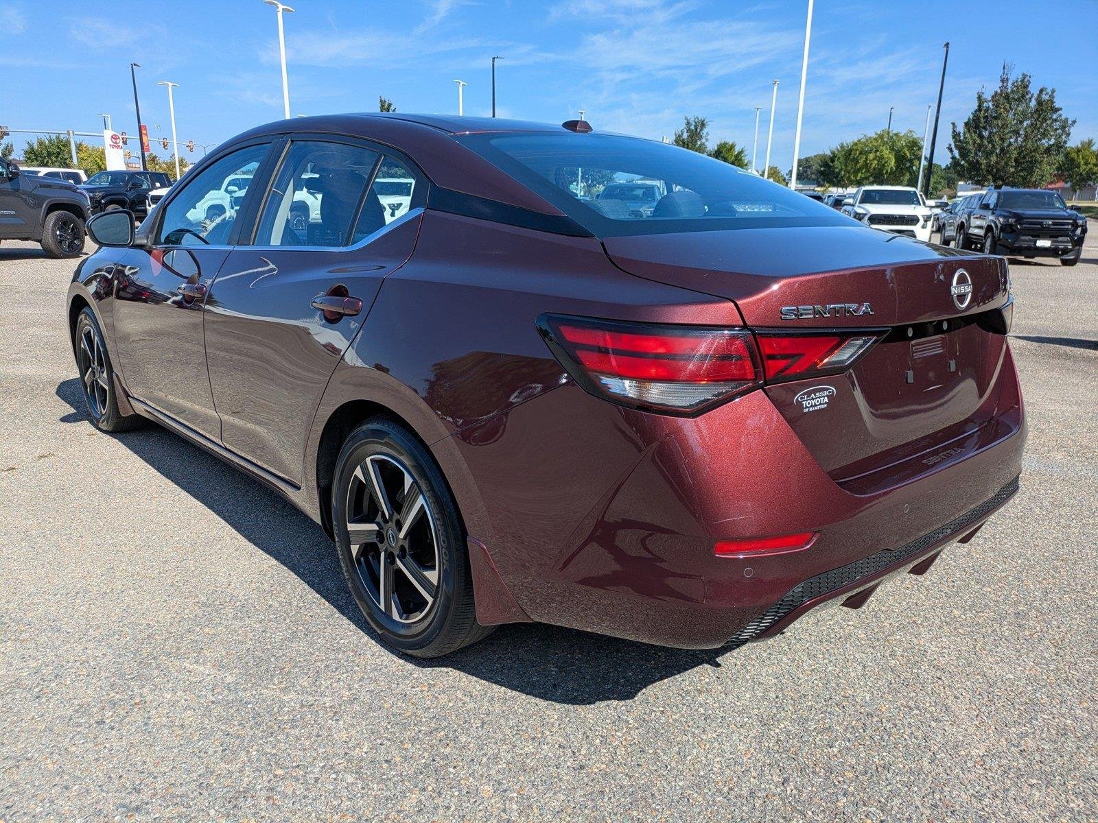 Used 2024 Rosewood Metallic Nissan SV image 6