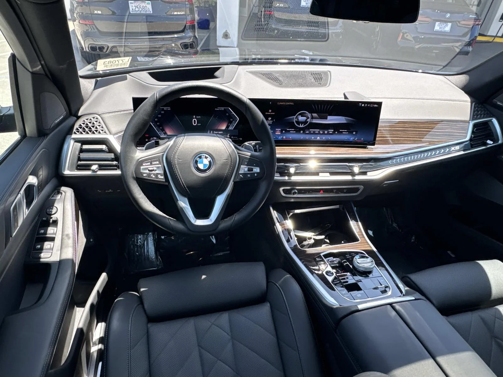 Used 2026 Black Sapphire Metallic BMW xDrive50e Plug-In Hybrid image 7