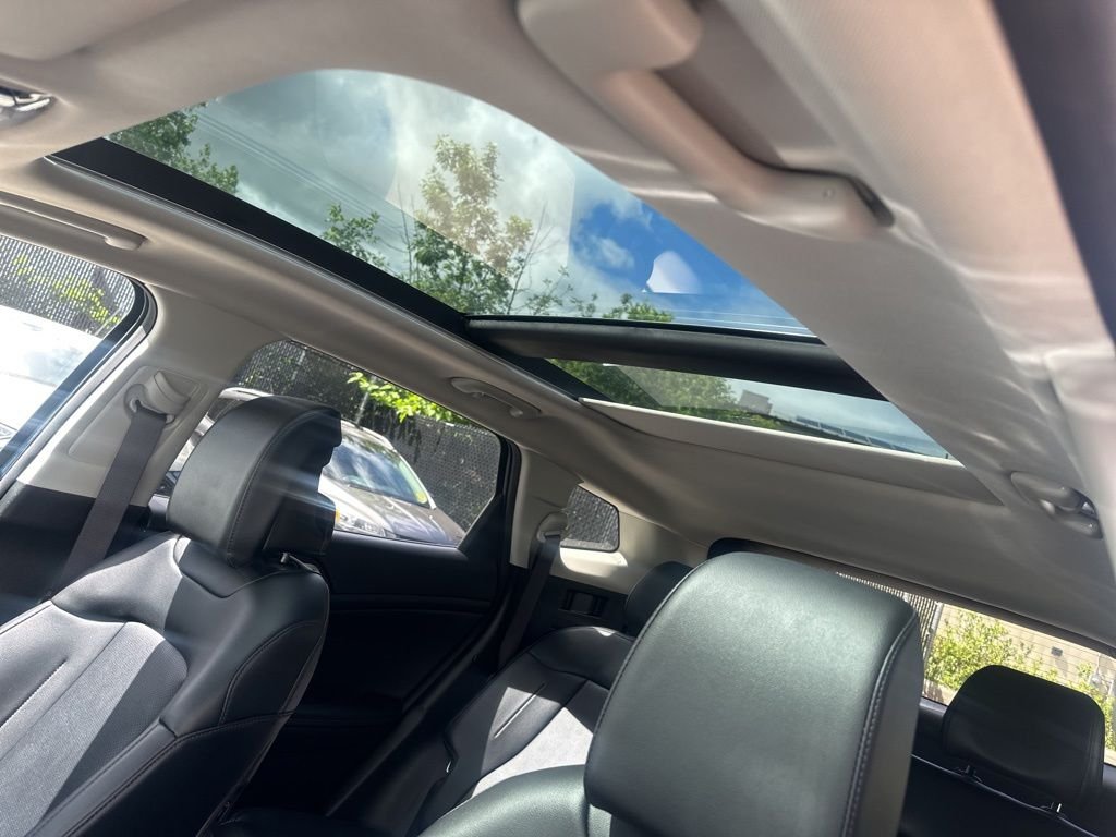 Used 2024 Blue Kia EX image 11