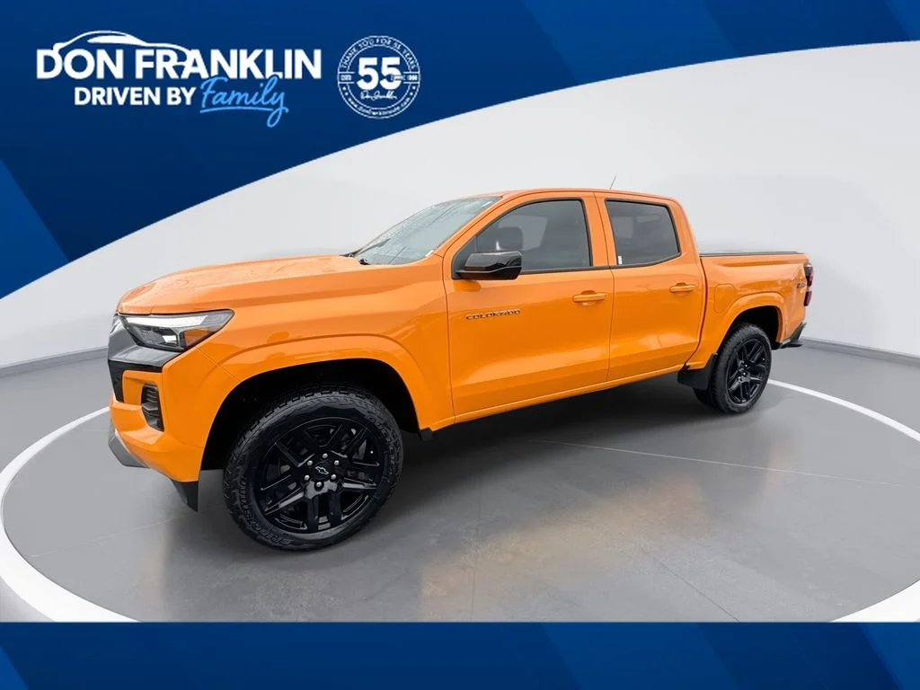 Used 2025 Orange Chevrolet Z71 image 1
