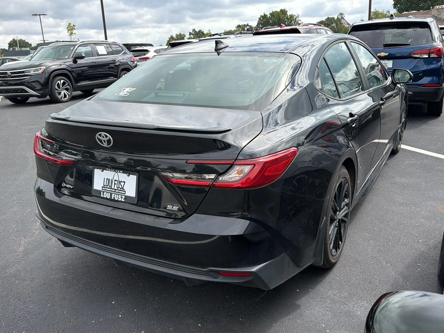 Used 2025 Midnight Black Metallic Toyota SE image 4