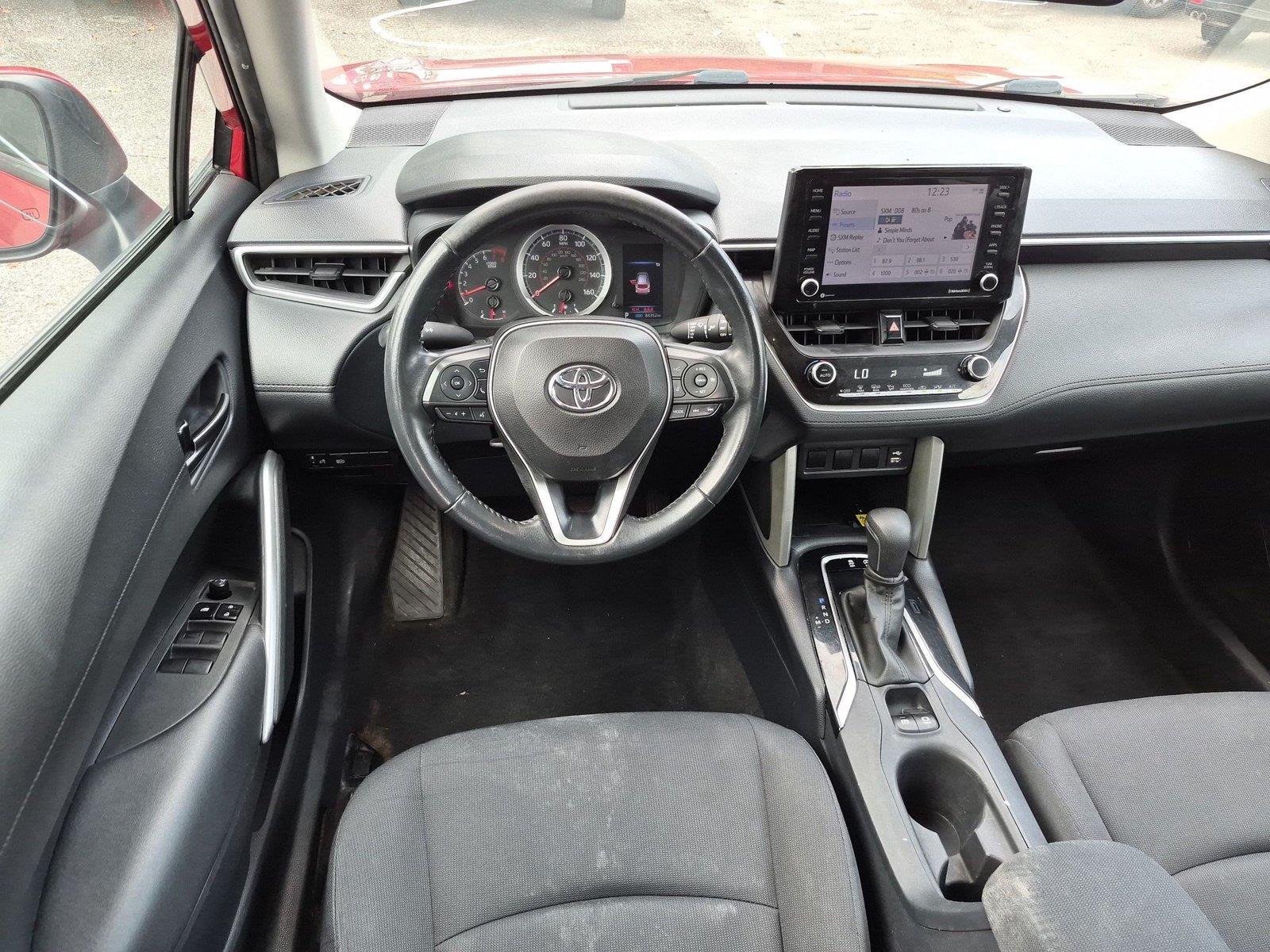 Used 2022 Barcelona Red Metallic Toyota LE image 32