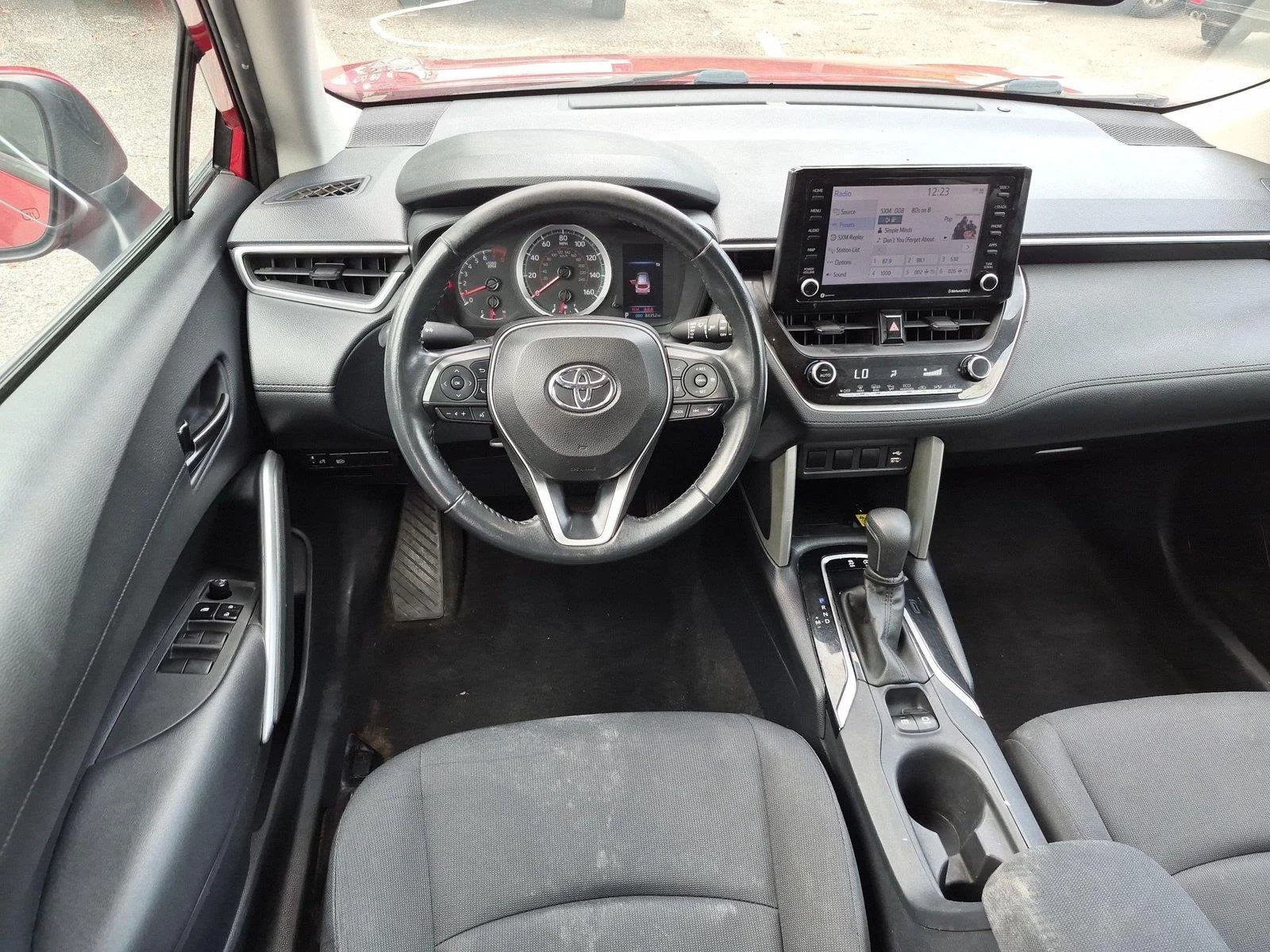 Used 2022 Barcelona Red Metallic Toyota LE image 32