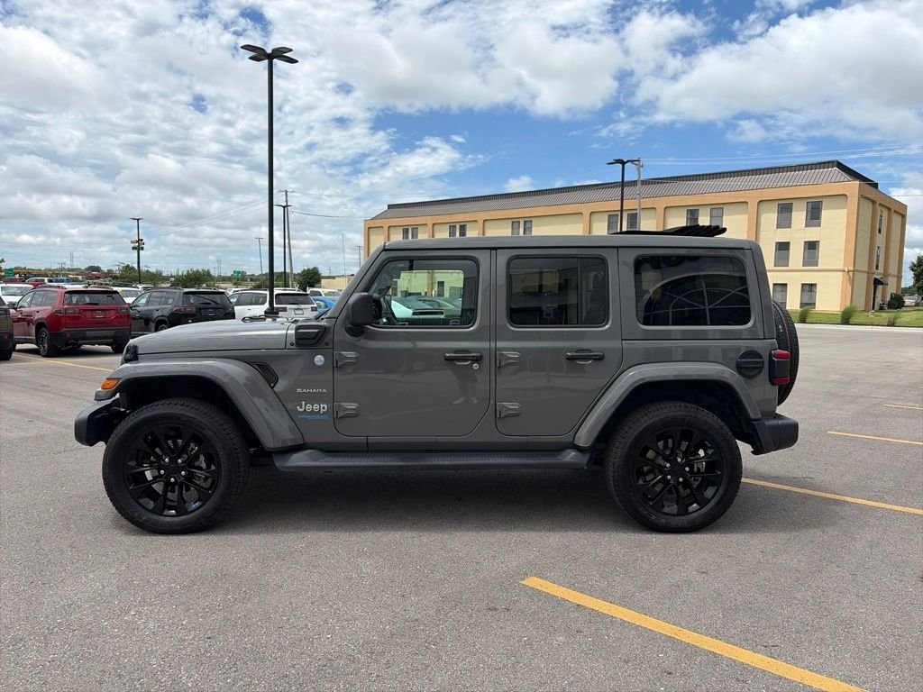 Used 2022 Jeep Wrangler Unlimited Sahara 4XE with VIN 1C4JJXP67NW277902 for sale in Kansas City
