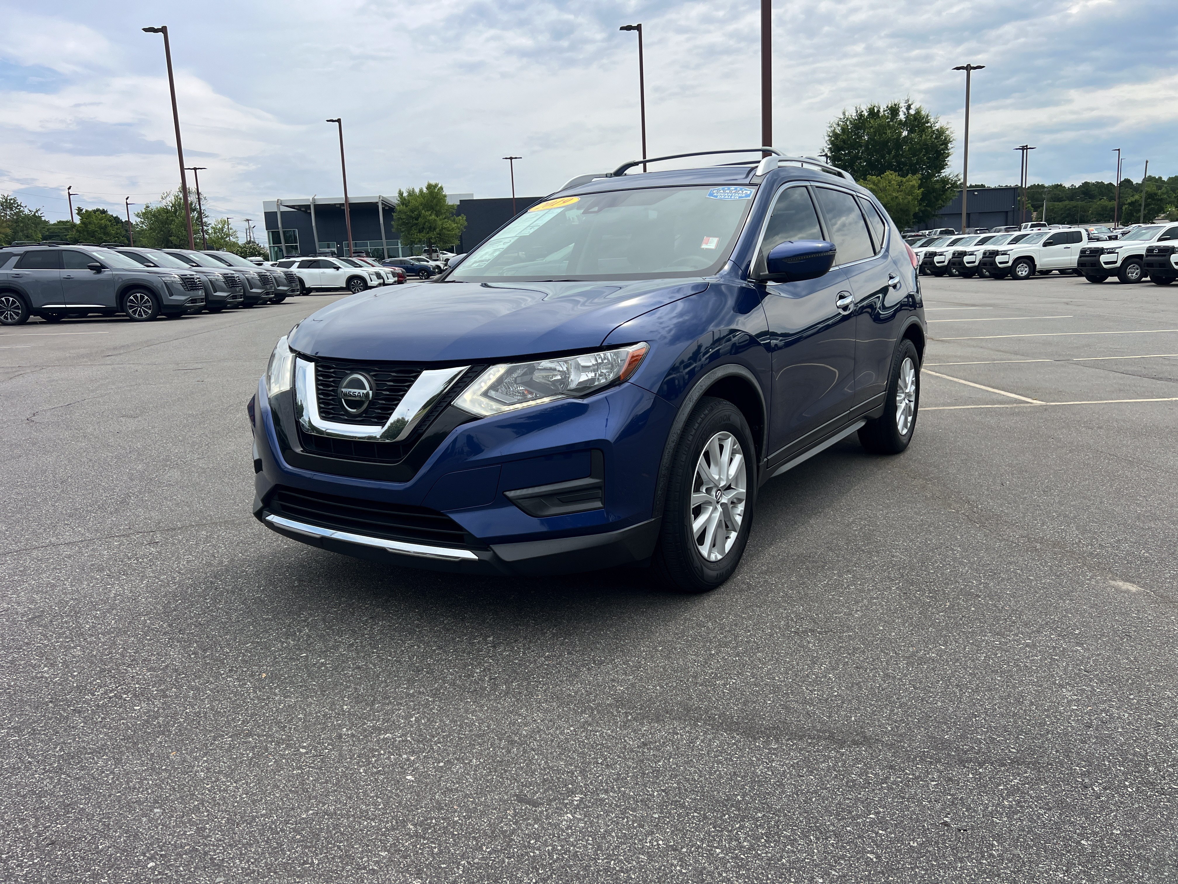 Used 2019 Caspian Blue Metallic Nissan SV image 1