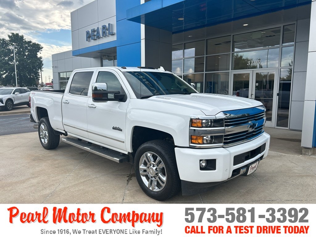 Used 2016 SUMMIT WHITE Chevrolet High Country image 1