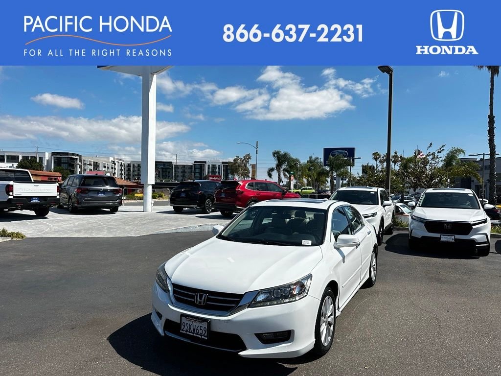 Used 2015 White Orchid Pearl Honda Touring image 1