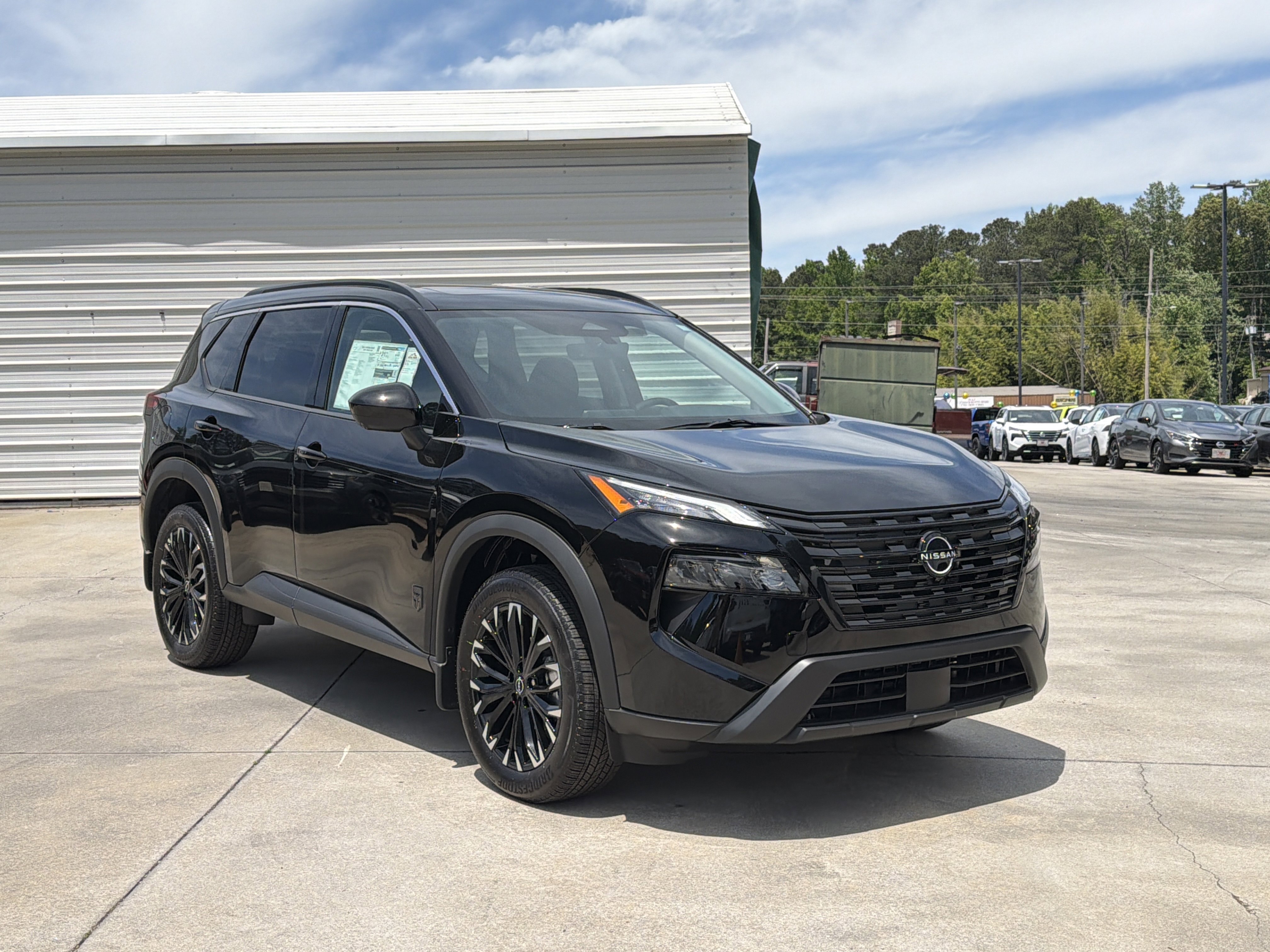 New 2026 Super Black Nissan Dark Armor image 2