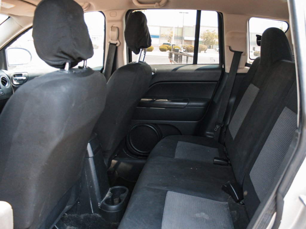 Used 2012 Bright Silver Metallic Clearcoat Jeep Sport image 18