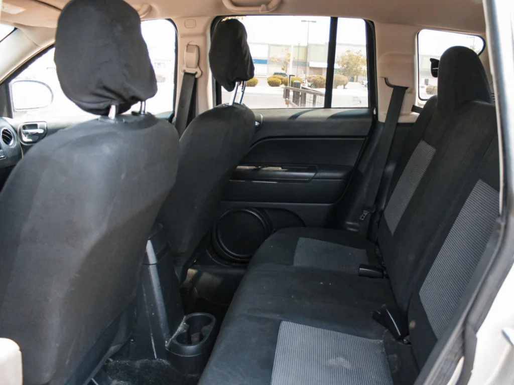 Used 2012 Bright Silver Metallic Clearcoat Jeep Sport image 18