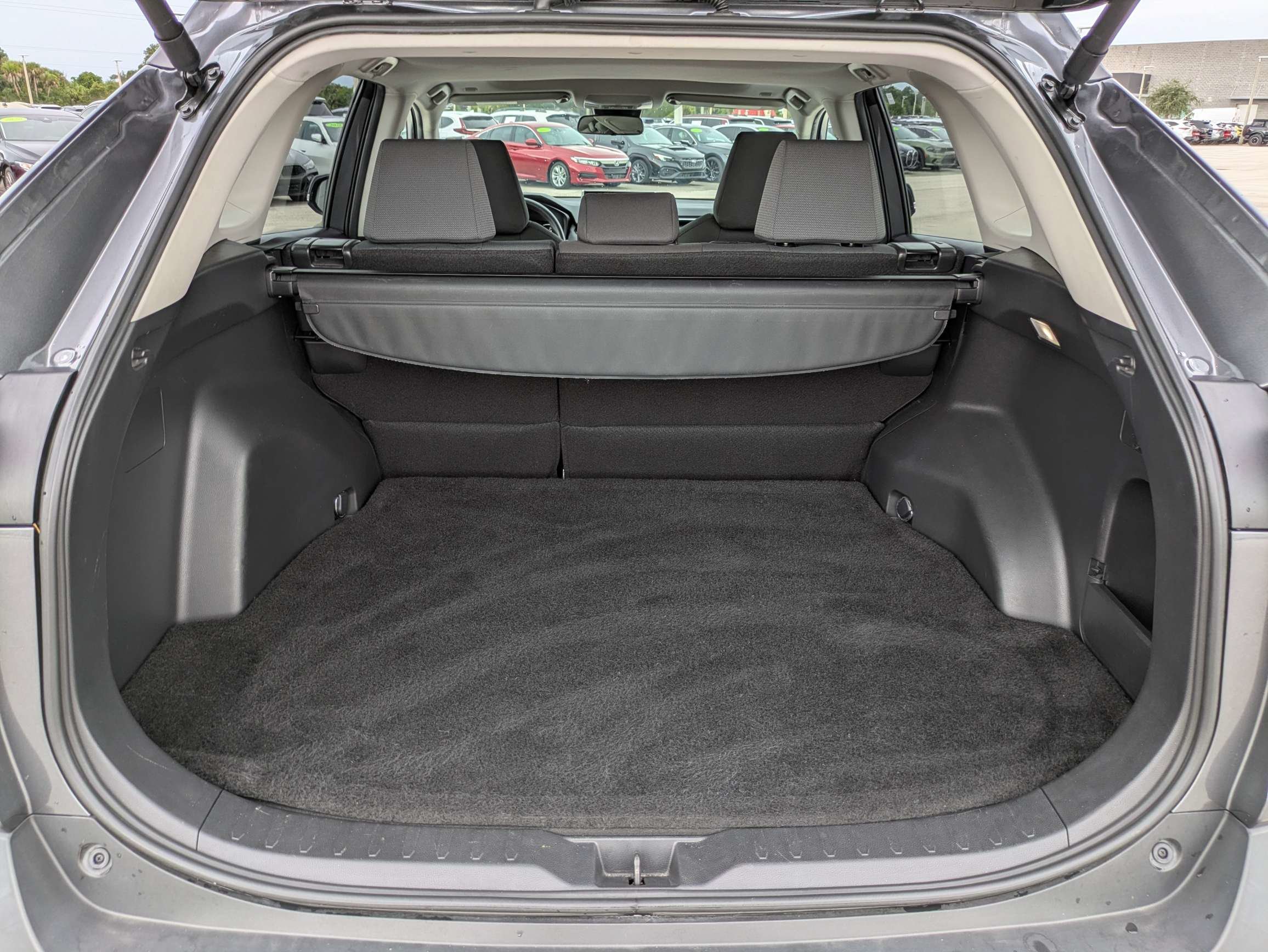 Used 2025 Magnetic Gray Metallic Toyota XLE image 13