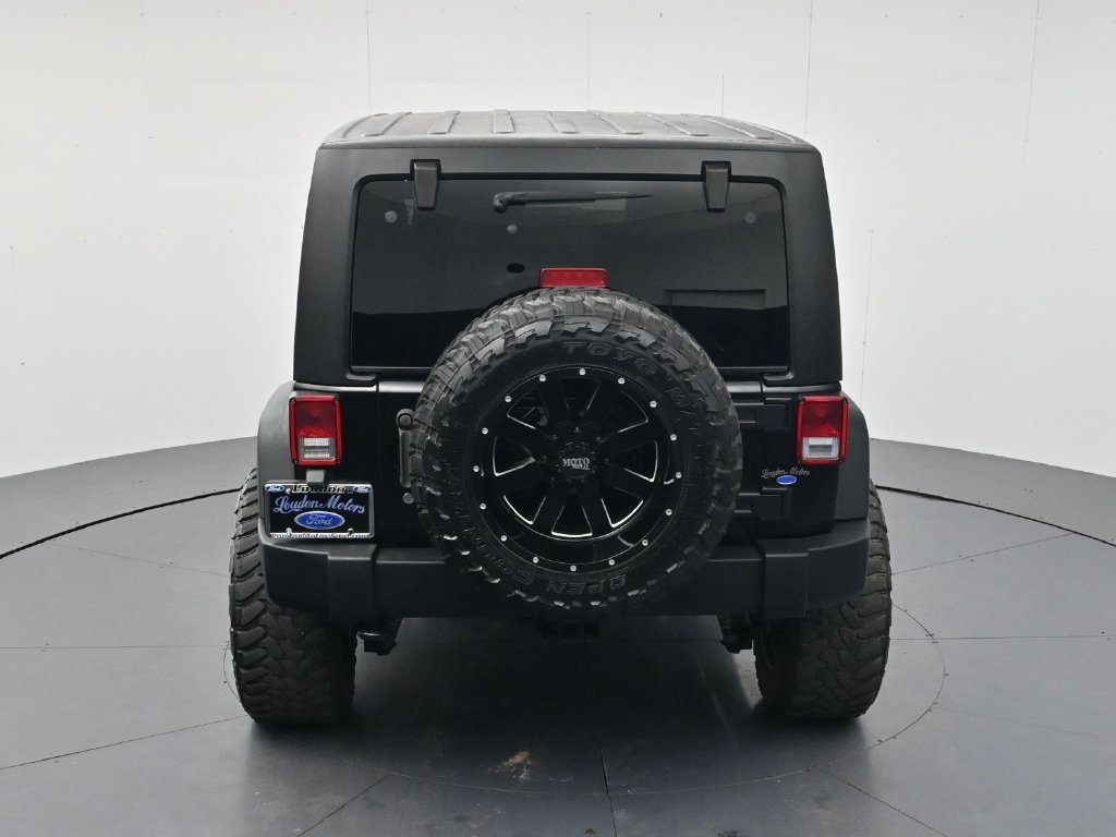 Used 2014 Black Clearcoat Jeep Unlimited Sport image 42