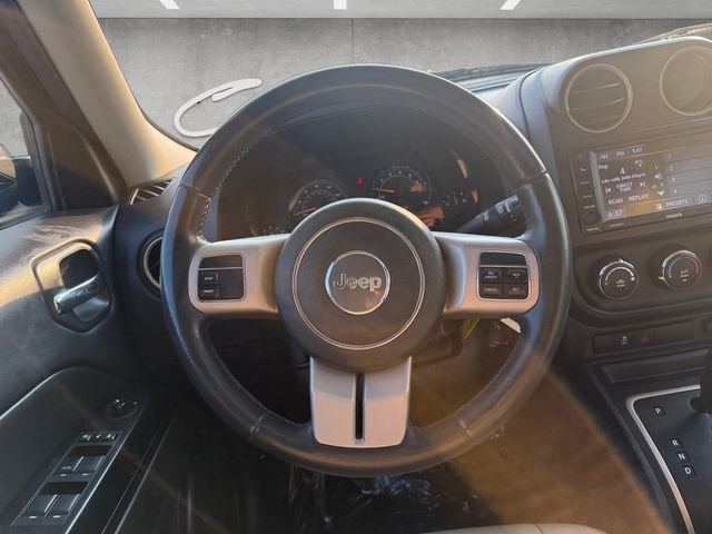 Used 2016 Granite Crystal Clearcoat Metallic Jeep Sport image 22
